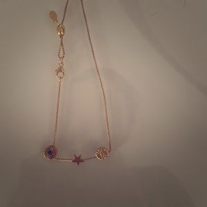 Alex and Ani bracelet with three charms